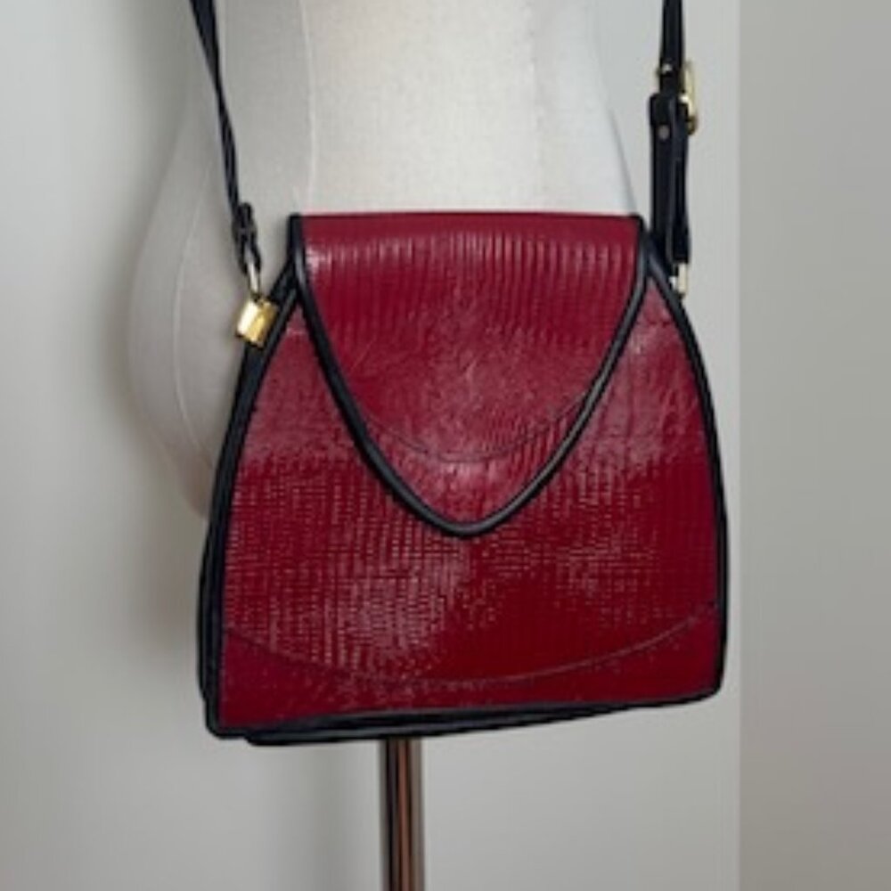 Red leather bag with black trim